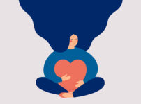 Young woman embraces a big red heart with mindfulness and love.